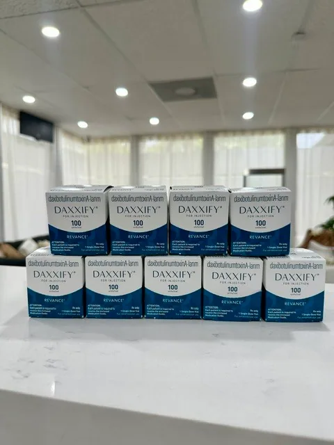 Daxxify neurotoxin cartons arranged on the practice counter.